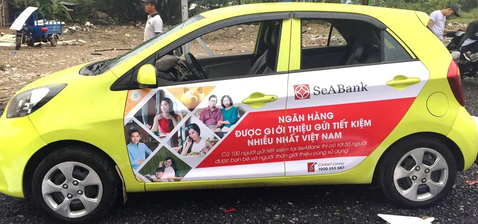 thi công dán quảng cáo trên xe ô tô tại Hà nội