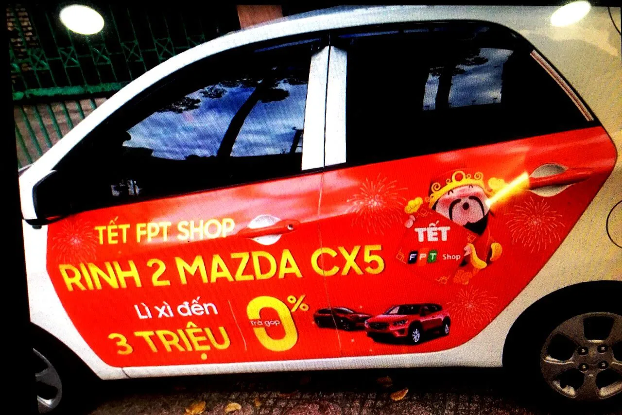 Quảng Cáo trên Xe Ô Tô - FPT Shop 2018